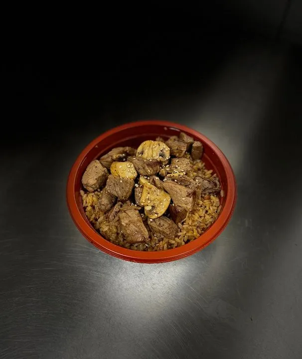 Hibachi steak bowl with vegetables and rice