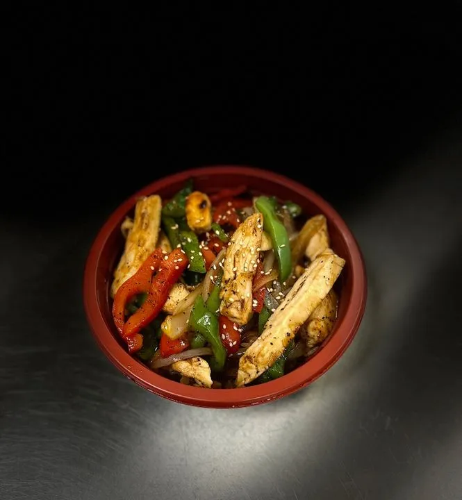 Hibachi shrimp bowl with rice and grilled vegetables