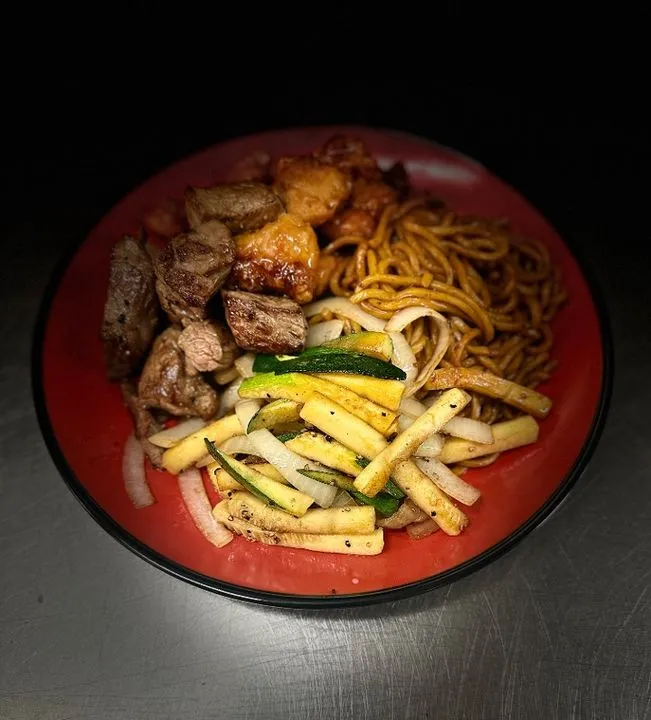 Orange chicken bowl with rice and vegetables