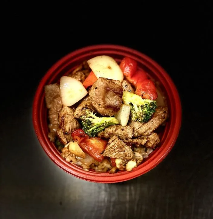 Hibachi plate served with rice and vegetables